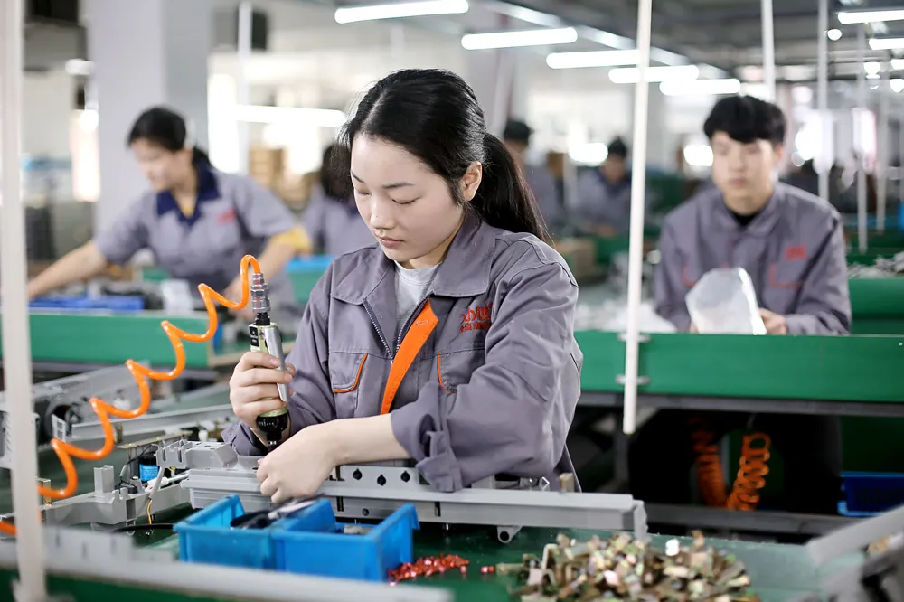 female technicians are making equipment